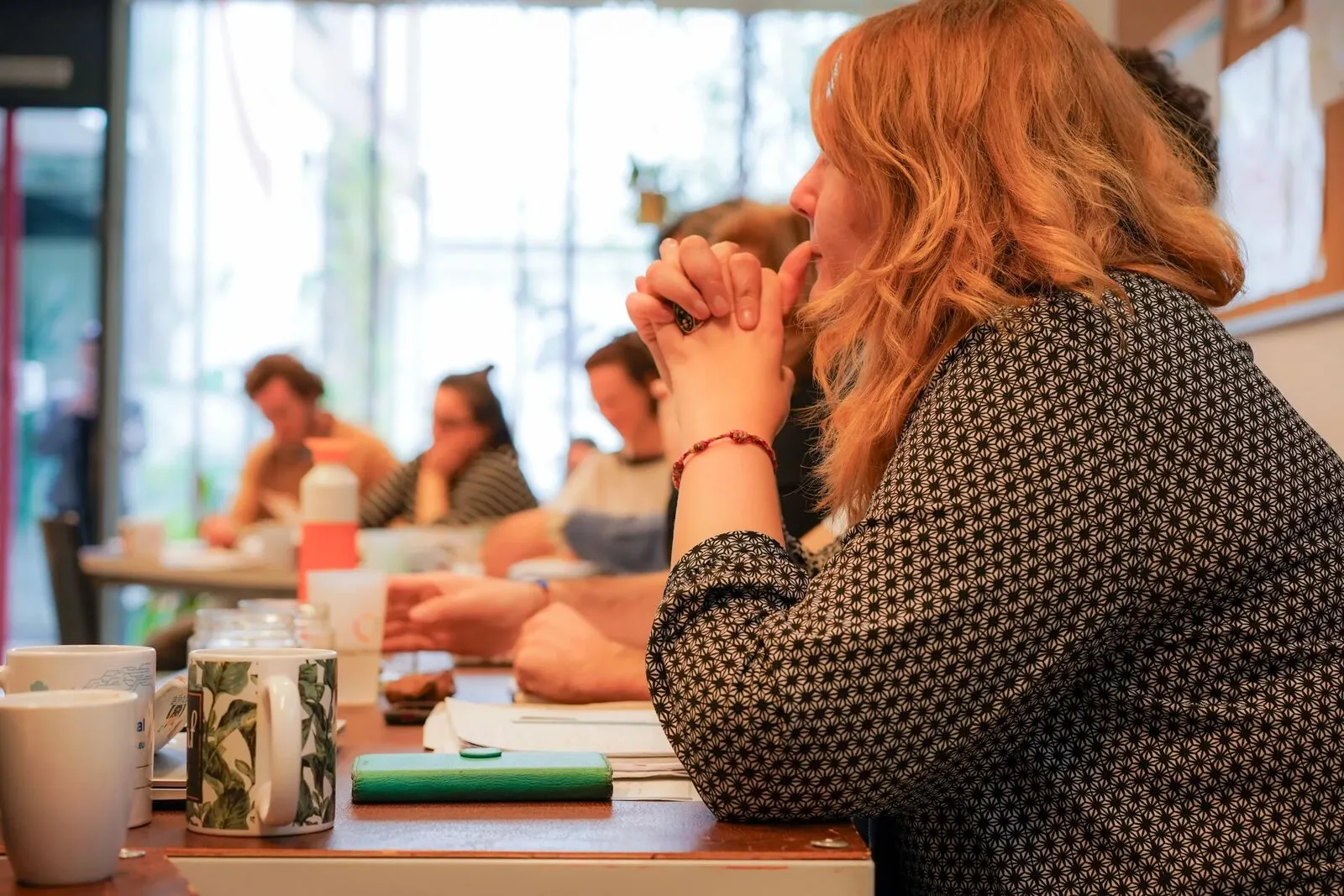 Een groepsworkshop met ondernemers die Groupe One begeleidt