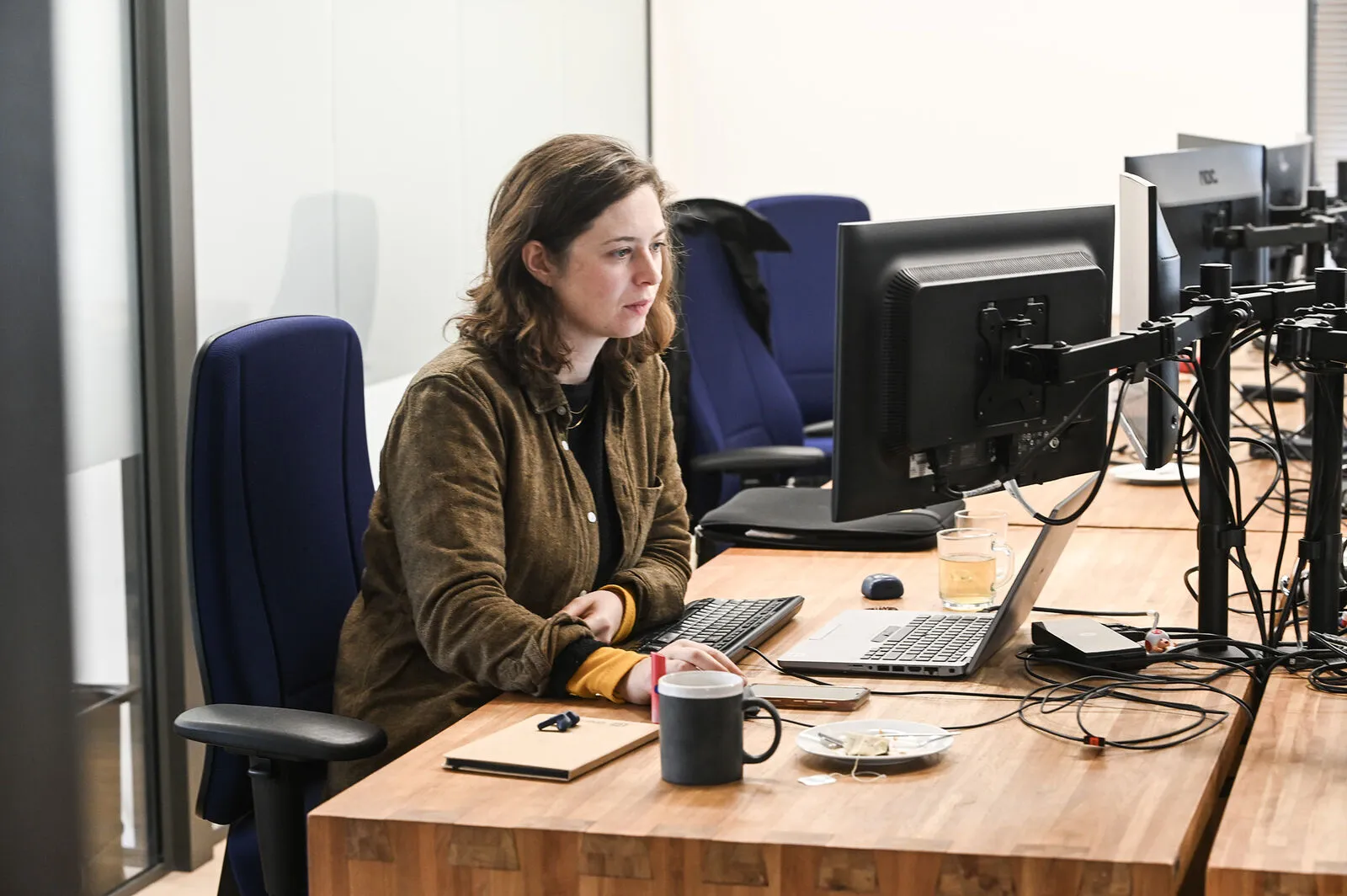 Une collaboratrice de Mérieux NutriSciences | Blonk au travail au bureau