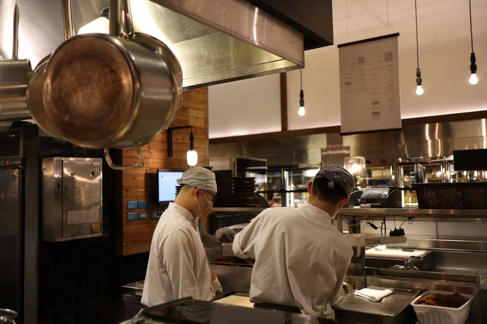 Chefs at work in a professional kitchen