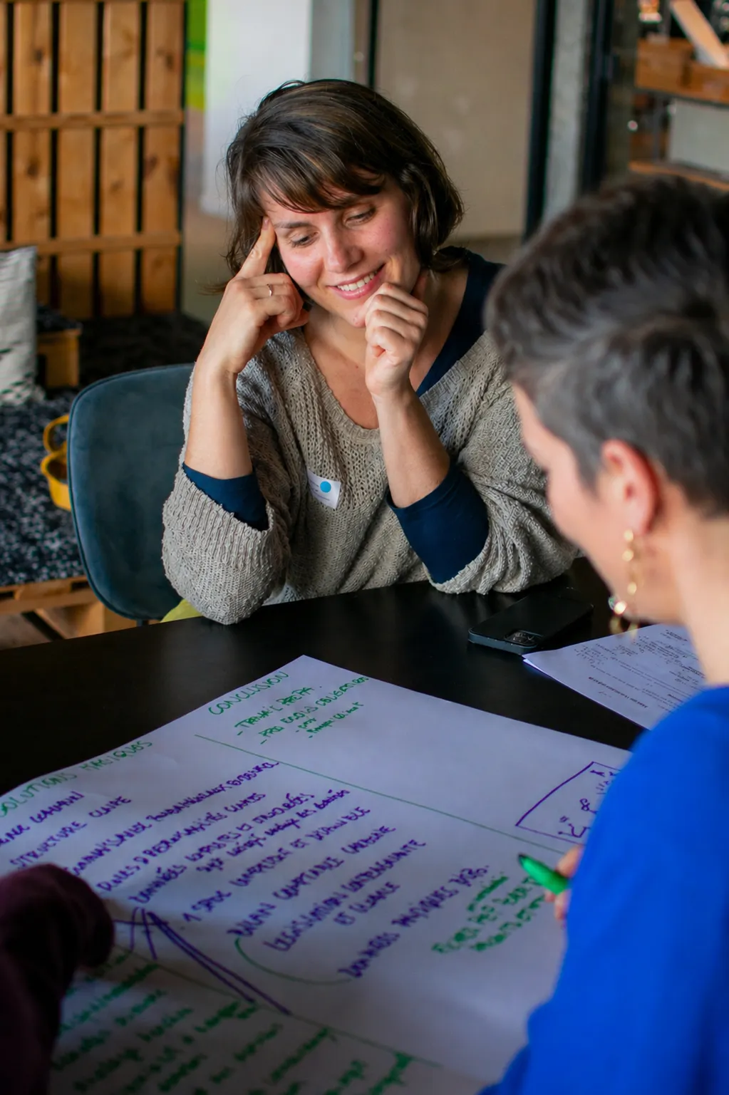 An SME owner reflecting on her reduction plan during a tapio session